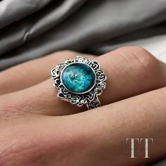 --Description✍️-- Embrace the allure of the moonlight with this captivating Elden Ring Dark Moon Ranni Ring! Inspired by the iconic Dark Souls Cold Oath Ring, this adjustable gem features a  crescent moonstone, channeling the ethereal energy of Ranni the Witch. Handcrafted from sturdy brass, this vintage-inspired design exudes a timeless charm, perfect for fans of the Elden Ring universe or anyone seeking a touch of mystical elegance. Wear it as a reminder of Ranni's enigmatic quest, or let it i Mystical Moon Phase Ring, Mystical Open Ring Promise Ring, Mystical Moon Phase Promise Ring, Magical Handmade Promise Rings, Moon Phase Rings As Gifts, Mystical Silver Crystal Ring, Mystical Sterling Silver Crystal Ring, Mystical Moon Phase Jewelry For Promise, Mystical Cabochon Rings As A Gift