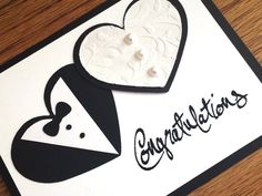 an congratulations card with two hearts on it