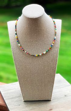 Freshwater Pearl Seed Bead Necklace A colorful mix of seed beads strung with tiny freshwater pearls, gives this necklace the perfect everyday look. Finished off with sterling silver clasps to allow for long lasting, hypoallergenic, comfortable wear <3 Special requests are always welcomed :) Bohemian Pearl Necklace With Colorful Beads As Gift, Bohemian Pearl Necklace With Tiny Beads For Gifts, Bohemian Pearl Necklace With Colorful Beads For Gift, Bohemian Pearl Necklace With Spacer Beads, Bohemian Pearl Necklace With Polished Beads, Handmade Multicolor Pearl Necklace With Round Beads, Bohemian Letter Beads Choker Gift, Bohemian Pearl Necklace With Colorful Beads And Adjustable Fit, Bohemian Pearl Necklace With Colorful Beads