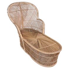 an empty wicker basket with handles on the bottom and sides, sitting in front of a white background