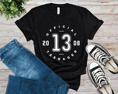 "🌴 Welcome to PacificDreamStudios! 🌴 https://www.etsy.com/shop/pacificdreamstudios 🎂 PERSONALIZED \"13 Official Teenager\" T-SHIRT 🎂 🎉 Bring a little humor to your birthday with this shirt! The super soft and comfortable fabric makes this the perfect shirt for going out or just plain lounging. Oh and did we mention, this could be the perfect gift for that special someone in your life? Check out the rest of our store for more birthday themed designs! 🎉 📌 STYLE AND FIT These t-shirts are ma Sweet 16 Shirts, Birthday Shirt For Women, 21st Birthday Shirts, Cute Birthday, Group Shirts, Birthday Tee, 13th Birthday, Cheap T Shirts, Couple Shirts