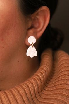 "\"Polymer clay earrings made entirely by hand, very slowly, in small batches. Non-allergenic, fade-free medical grade titanium posts. Approximate dimensions: 3cm x 2cm\"" White Minimalist Jewelry, Minimalist Small White Jewelry, White Clay Earrings As Gift, White Clay Earrings For Gift, White Clay Earrings For Gifts, White Clay Jewelry As A Gift, Hypoallergenic White Plug Earrings, Nickel-free White Plug Earrings As Gift, Nickel-free White Plug Earrings For Gift