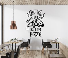 a wall decal that says you are what you eat, so i am pizza