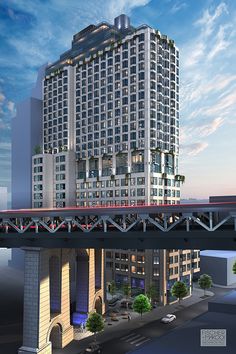 an artist's rendering of a high rise building with a train crossing over it