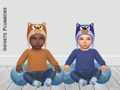 two children wearing animal hats sitting on the floor