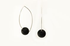 Onyx on Silver Wire Earrings by Claudia Endler (Silver & Stone Earrings) | Artful Home Modern Wire Wrapped Earrings, Black Minimalist Jewelry With Ear Wire, Minimalist Handmade Black Earrings, Black Circle Earrings With Ear Wire, Artisan Black Beaded Earrings With Ear Wire, Black Minimalist Sterling Silver Hoop Earrings, Handmade Black Contemporary Earrings, Minimalist Sterling Silver Sphere Earrings, Gold Bar Earrings Studs