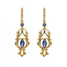 Natural Blue Sapphire Gemstone Earrings in 9k Solid Yellow Gold, One of a kind Yellow Gold Jewellery, Gold Filigree Earrings Product Details > Gemstone - Natural Blue Sapphire > Materials - 9k Solid Yellow Gold > Gemstone Shape - Marquise & Round Cut > Earring Length : 39mm length Approx > Earring Width : 12mm Approx > Gross Weight - 3.800 grams Approx > Setting type - Prong, bezel setting *Production Time: This is one of a kind unique piece, it's possible to make the same style again but not po Elegant Pierced Sapphire Earrings, Elegant Sapphire Earrings, Pierced, Elegant Sapphire Pierced Earrings, Hallmarked Sapphire Earrings In Yellow Gold, Hallmarked Yellow Gold Sapphire Earrings, Yellow Gold Sapphire Earrings Hallmarked, Yellow Gold Sapphire Earrings For Pierced Ears, Victorian Sapphire Jewelry In Gold, Victorian Gold Sapphire Jewelry