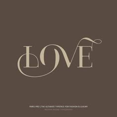 the word love is written in brown and white on a dark background with an ornate font