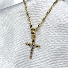 14K Gold Crucifix Cross Pendant With 1.2MM Singapore Chain Religious Charm Necklace, Christian Jewelry Gift  ✅ PENDANT SPECIFICATIONS:  * Single Sided * Height: 0.59 in. (15 MM) * Width: 0.39 in. (10 MM) * Average Weight: 0.4 gr. ✅ CHAIN SPECIFICATIONS:  * Clasp: Spring-Ring  * Width: 1.2 MM ➤ Length: 16 inches   Avg Weight: 1.04 ➤ Length: 18 inches   Avg Weight: 1.12 ➤ Length: 20 inches   Avg Weight: 1.26 ➤ Length: 22 inches   Avg Weight: 1.35 ➤ Length: 24 inches   Avg Weight: 1.42 ✅SHIPPING CONTENTS: -14K Gold Pendant & Chain -Jewelry Box ✅ PREMIUM 14K GOLD:  Our jewelry is crafted from durable high quality materials, gems, and stones; hand-stamped for authenticity as well as FTC law approved. Unlike cheap costume jewelry, our long lasting jewelry is easy to polish and and won't permanen Gold-plated Cross Pendant Necklace With Chain, Gold Plated Cross Chain Jewelry, Gold Plated Tarnish Resistant Crucifix Necklace, Gold Plated Chain Cross Jewelry, Gold Plated Crucifix Necklace Tarnish Resistant, Gold-plated Tarnish-resistant Crucifix Necklace, Figaro Chain Cross Necklace As Gift, Gold Chain Cross Necklace As A Gift, Yellow Gold Chain Necklace With Cross Pendant