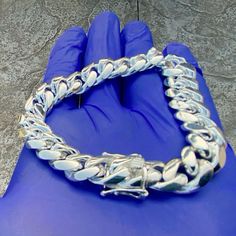 Men's Miami Cuban chain bracelet. Measures 8.5" inch long x 12MM thick. 925 Sterling silver - stamped "925". Real solid 925 sterling silver jewelry. Solid weight to it at approx. 75 grams. Stylish & secure snap box lock w/stamp. Won't change color or turn your skin green. Really well made piece shines bright. Enjoy a 30 day satisfaction guarantee. FREE SHIPPING in USA. Order now! Miami Cuban Link, Miami Cuban, Wrist Wear, Hip Hop Jewelry, Cuban Chain, 925 Sterling Silver Jewelry, Link Bracelets, Solid 925 Sterling Silver, Chain Bracelet