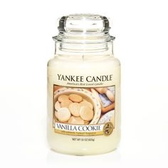 yankee candle with vanilla cookie inside on white background