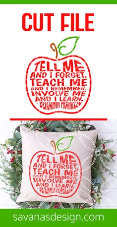 an apple pillow with the words cut file in red and green, on top of it