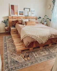 a bed made out of wooden pallets in a bedroom