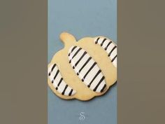 a cookie with black and white stripes on it