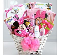 a basket filled with minnie mouse items on top of a table