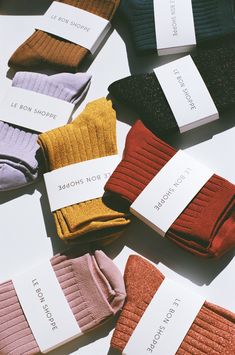 Soft and silky knit socks that hit at just the right height. Pair with heels, sandals, or tennis shoes to add a cool pop of color. Made in Korea Size: o/s Socks Campaign, Socks Photography Ideas, Socks Photoshoot, Socks Photography, Sock Store, Socks Aesthetic, Socks Packaging, Cool Pops, Stylish Socks