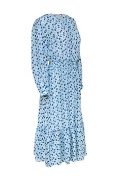 This poppy floral print adds a playful and feminine addition to your summer wardrobe with this Tucker dress. This signature Juliette dress features enchanting long sleeves, button front bodice with neck tie, and a smocked waist that flatters your figure. Pair this with sandals and a crossbody for your summer weekend adventures! Size L 100% silk Unlined Tie neckline Quart button front Stretch cinched waist Bust 41.5" Waist band un-stretched 25" Shoulder to hem 49.75" Sleeve length 23.5" Spring Long Sleeve Floral Dress With Ruffle Hem, Spring Floral Dress With Ruffle Hem And Long Sleeves, Long Sleeve Ditsy Floral Dress For Spring, Blue Long Sleeve Floral Dress For Garden Party, Long Sleeve Smock Dress For Garden Party, Summer Long Sleeve Smocked Midi Dress, Summer Long Sleeve Midi Dress With Smock, Summer Long Sleeve Midi Dress With Smock Detail, Long Sleeve Smocked Dress With Ruffle Hem For Daywear