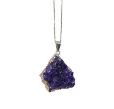 Find spiritual protection and beauty with this genuine, raw crystal druzy amethyst wonder. Looking for an all natural, handmade gemstone pendant handcrafted by artisan hands? Then get yourself this raw, rough crystal amethyst pendant necklace. Most other online gemstone pendants are low-quality, mass-manufactured pieces of plastic that don't actually contain any genuine gemstone or metal material. Unlike the rest of the crowd, this Element of Zen pendant is made of genuine rough, un-treated purp Spiritual Amethyst Crystal Necklace With Raw Stone, Amethyst Raw Stone Necklace For Healing, Amethyst Crystal Pendant Gift, Purple Raw Stone Crystal Pendant Necklace, Amethyst Raw Stone Pendant Necklace, Amethyst Pendant Necklace With Raw Stone, Amethyst Raw Stone Crystals For Gift, Spiritual Amethyst Jewelry With Raw Stone, Purple Raw Stone Mineral Crystal Jewelry