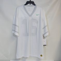 Details Step Up Your Game With The Nike Men's Drifit All White Football Jersey #16. Crafted For Athletes Who Demand Both Style And Performance, This Jersey Is Made From Premium Materials Designed To Keep You Comfortable And Focused On The Game. The Body Of The Jersey Is Constructed From 100% Polyester, Offering A Lightweight And Durable Feel That Stands Up To The Rigors Of Intense Play. The Side Panels, Made From A Blend Of 65% Cotton And 35% Polyester, Provide Enhanced Breathability And Comfort Nike White Tops For Sports Season, White Nike Tops, White V-neck Sportswear Top, White V-neck Top For Sports Season, Travis Kelce Jersey, Desean Jackson, Color Rush, Red Team, Beckham Jr