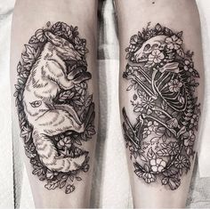 two black and white tattoos on both legs with an image of a wolf in the middle