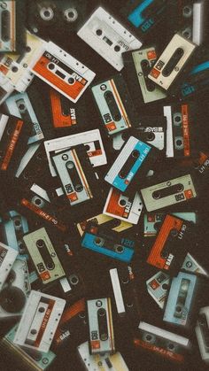 a pile of cassettes sitting on top of each other