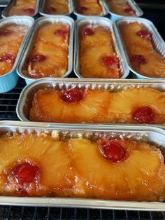 pineapple upside down cake in tins on the oven rack, ready to be baked