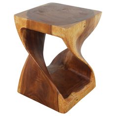 a wooden table with an unusual design on the top and bottom, made out of wood