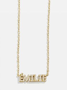 Orders placed through 11/26 11:59pm EST will be delivered by 12/19. Spell it out with the 18K Gold Mini Nameplate Necklace. This custom name piece features a modern gold chain attached to your choice of a pavé or gold nameplate. Featuring the personalization of your choosing. Crafted with 18K gold plated sterling silver and Cubic Zirconia stones, you'll be wearing it for years to come. To add an accent, press and hold the Control key (CTRL), the Apostrophe key (‘), and the intended letter. Copy Gold Name Necklace, Nameplate Necklace, Custom Gifts, One Week, Name Plate, Gold Plated Sterling Silver, Name Necklace, Custom Items, Custom Name