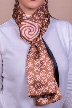 This is a unique handpainted silk scarf in brown - beige colors that could be a perfect gift for him or for her. A unisex scarf that fits perfectly to everyone and can be the perfect solution for your style. DETAILS Fabric : Crepe Satin 16m/m Dimension : 35cm x170cm Weight : 42gr Print : Digital Finished : by hand Code : 18-35-225 Gift box included ! ABOUT We design beautiful silk scarves. Creating with passion excellent quality silk scarves. Ancient Greece is our inspiration! Our silk products Beige Silk Scarves As Gift, Beige Silk Scarves For Gifts, Silk Beige Scarf As Gift, Beige Silk Scarf For Gift, Handmade Brown Scarves For Gifts, Silk Products, Handpainted Silk Scarves, Scarf Summer, Hand Painted Scarves