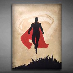 the silhouette of a man with a red cape