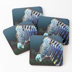 four coasters with an image of zebra's head in blue and green colors