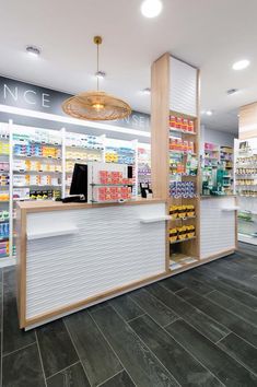 the inside of a store with shelves filled with products