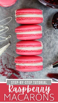 raspberry macarons are stacked on top of each other with icing