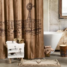 a bathroom with a shower curtain, rug and bathtub