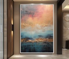 an abstract painting hangs on the wall next to a large door in a modern room