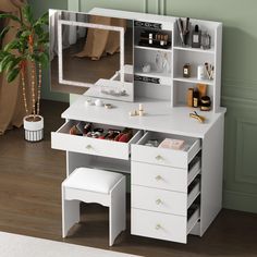 a white desk with drawers and a mirror