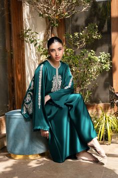 Aja Green Palazzo Set With Embroidered Border For Eid, Elegant Green Kurta With Embroidered Border, Elegant Green Set With Embroidered Border, Elegant Green Sets With Embroidered Border, Elegant Green Kaftan With Resham Embroidery, Green Embroidered Kaftan For Eid, Teal Shirt, Pants Model, Designer Name