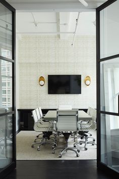 interior design office design wall covering wallpaper office gold sconces wood stained floors rug