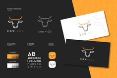 two business cards with bull heads on them and the words cow dev written in different languages