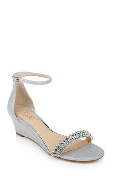 a women's silver wedged sandal with crystal embellishment