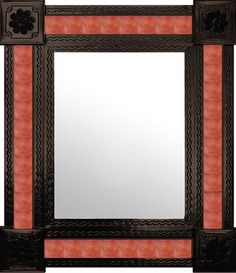 a mirror with blue and black designs on it