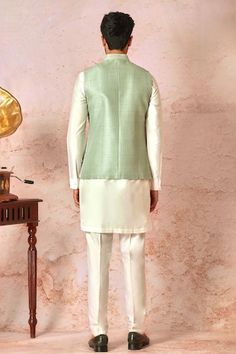 Mint green bundi with vintage jaal pattern, contrast dori and lurex badla embroidery. Paired with cream full sleeve kurta and pant style pyjama. - Aza Fashions Badla Embroidery, Badla Work, Full Sleeve Kurta, Nehru Jacket, Pant Style, Embroidered Silk, Raw Silk, Mandarin Collar, Aza Fashion