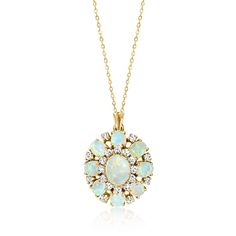 Ross-Simons - C. 1970 Vintage Opal, 1.00ct t. w. Diamond Cluster Pendant Necklace. 18". C. 1970. From our Estate collection, this stunning cluster pendant necklace swirls with a magnificent play of color and sparkle! 7x5mm-10x8mm oval opal cabochons create a sensational symmetrical design, studded by 1.00 ct. t. w. round brilliant-cut diamonds in between. Finely crafted in polished 18kt yellow gold. Cable chain. Lobster clasp, diamond and opal cluster pendant necklace. Exclusive, one-of-a-kind E Oval Multi-stone Necklace For Wedding, Fine Jewelry Oval Necklace For Collectors, Oval Fine Jewelry Necklace For Collectors, Multi-stone Round Pendant Necklace For Anniversary, Oval Large Pendant Necklaces For Wedding, Anniversary Necklace With Large Oval Pendant, Opal Necklaces, Necklace With Diamonds, Symmetrical Design