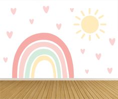 an empty room with a rainbow painted on the wall and hearts drawn on the wall