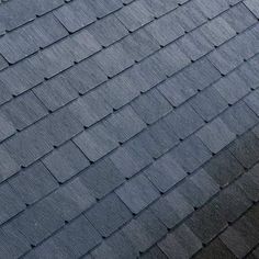 an image of a roof that looks like it is made out of wood shingles