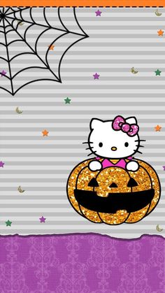 hello kitty halloween wallpaper with pumpkin and spider web