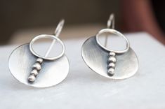 "International deliveries in 2-4 business days as standard shipping. Totally handmade from 925 solid sterling silver. This pair of lovely tribal dangle earrings are made by me in my studio using traditional metalsmith techniques. Length: 45 mm(1.77\") (including ear hook). Width 25 mm(0.98\").Bestseller!! It comes gift wrapped and ready for giving! ✿REGISTERED MAIL WITH TRACKING NUMBER ✿All of our jewelry are made to order. Allow for about a week for the jewelry to be made. ✿ keep in mind that t Bohemian Sterling Silver Drop Earrings, Bohemian Sterling Silver Earrings Stamped 925, Handmade Sterling Silver Bohemian Earrings, Silver Bohemian Earrings For Everyday, Handmade Bohemian Sterling Silver Earrings, Bohemian Sterling Silver Earrings, Bohemian Silver Earrings For Everyday, Sterling Silver Circle Earrings With Oxidized Finish, Handmade Unique Sterling Silver Hoop Earrings