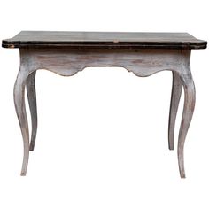 an old wooden table with two legs and a drawer on the top, isolated against a white background