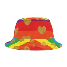 Introducing our vibrant and chic line of bucket hats that redefine style with their bold patterns and colors! Embrace individuality with our range featuring rainbow hues, dazzling gold and silver foil designs, and playful hearts and stripes. Crafted for all sizes, from the fashion-forward to the trend-setting, our hats come in both large and small sizes. Elevate any outfit and make a statement with these eye-catching accessories that merge fashion and personality effortlessly. Step out in confid Rainbow Bar, Feuille D'or, Stylish Hats, Bucket Hats, Silver Foil, Sew-in Labels, Gold Foil, Caps Hats, Bucket Hat