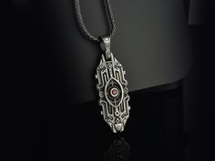 Futuristic Starship Silver Pendant with Red Gemstone for Sci-Fi Enthusiasts - Unique Spaceship Necklace, Cosmic Silver Jewelry, Gothic Gifts 🚀 Journey to the stars with our Futuristic Starship Silver Pendant, a treasure for Sci-Fi enthusiasts and cosmic adventurers alike. This necklace, reminiscent of an interstellar spacecraft, features intricate circuit-like engravings with a central red gemstone, symbolizing the heart of the vessel. Perfect for space opera aficionados or as an eye-catching p Spaceship Necklace, Si Fi, Buddha Jewelry, Jewelry Gothic, Amazonite Necklace, Chevron Necklace, Gothic Gifts, Cheap Necklaces, Red Gemstones